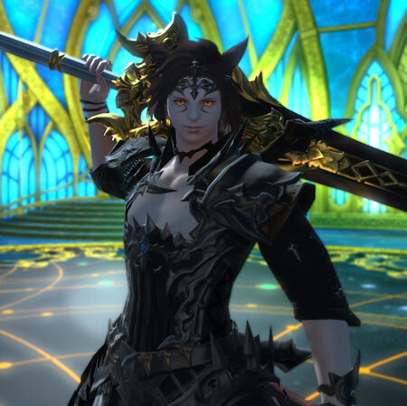 Kheda holds a greatsword at their back in a black armored gown. They wear a black circlet on their forehead. Their eyes glow orange. They smile confidently at the viewer.