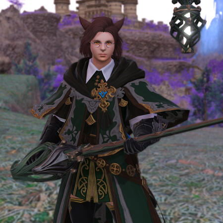 Kheda in a green and gray robe with gold accents. He wears a green and gold mini skirt with black thighboots. He holds his rapier balanced in his hand while his focus floats nearby.